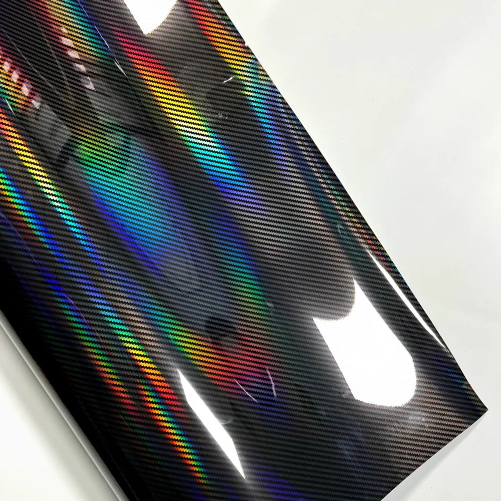 Holographic vinyl wrap sheet with multicolor pattern on a white background