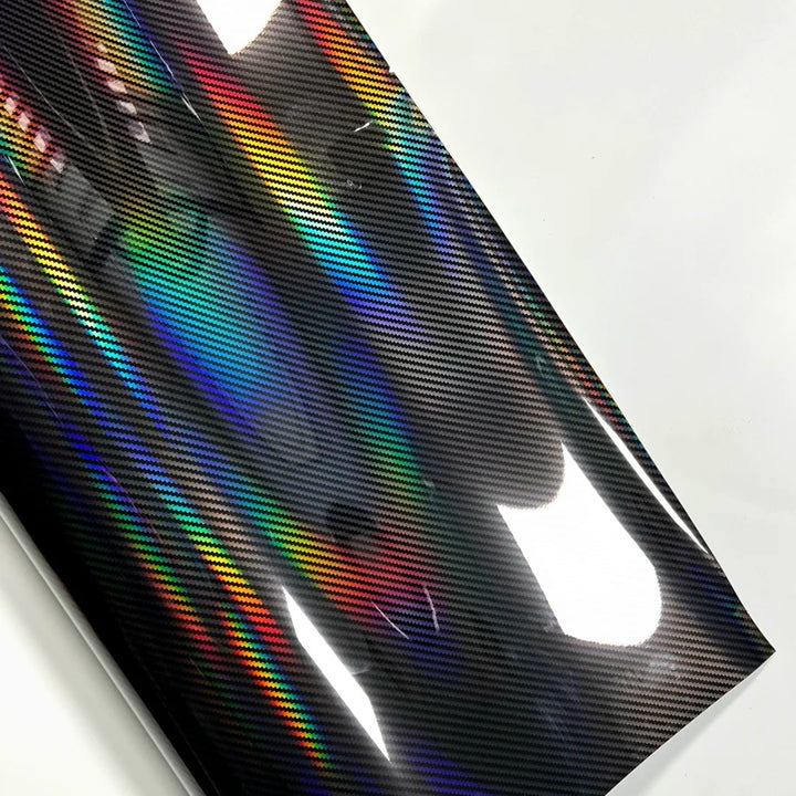 Holographic vinyl wrap sheet with multicolor pattern on a white background