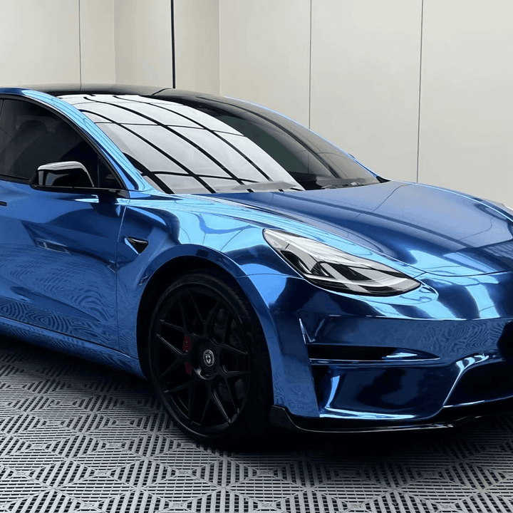 blue mirror chrome vinyl wrap on tesla